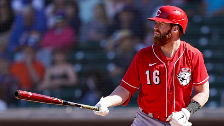 Cincinnati Reds infielder Colin Moran (16) gets set for a pitch during a spring training game.