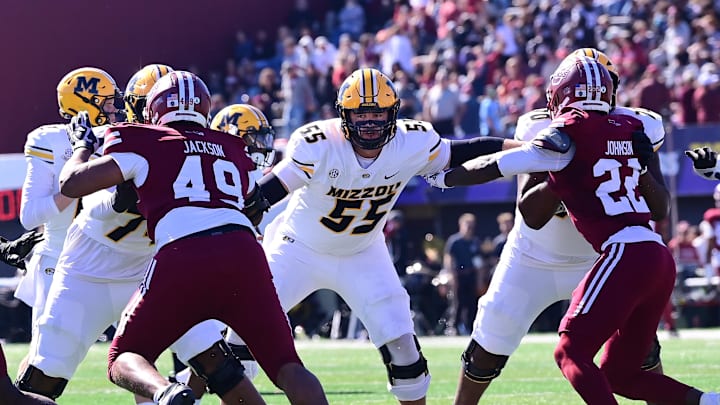 Oct 12, 2024; Amherst, Massachusetts, USA; Missouri Tigers offensive lineman Connor Tollison (55) blocks during the first half against the Massachusetts Minutemen at Warren McGuirk Alumni Stadium. Mandatory Credit: Eric Canha-Imagn Images Oct 12, 2024; Amherst, Massachusetts, USA; Missouri Tigers offensive lineman Connor Tollison (55) blocks during the first half against the Massachusetts Minutemen at Warren McGuirk Alumni Stadium. Mandatory Credit: Eric Canha-Imagn Images