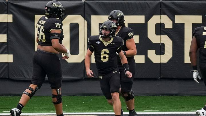 Oct 3, 2026; Winston-Salem, North Carolina, USA; Wake Forest Demon Deacons quarterback Steele Pizzella (6) celebrates his touchdown run against the Stanford Cardinal during the second half at Allegacy Federal Credit Union Stadium. Mandatory Credit: Jim Dedmon-Imagn Images Oct 3, 2026; Winston-Salem, North Carolina, USA; Wake Forest Demon Deacons quarterback Steele Pizzella (6) celebrates his touchdown run against the Stanford Cardinal during the second half at Allegacy Federal Credit Union Stadium. Mandatory Credit: Jim Dedmon-Imagn Images
