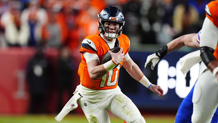 Denver Broncos quarterback Bo Nix (10) runs during the fourth quarter of an AFC Divisional Round playoff game against the Buffalo Bills at Empower Field at Mile High. 