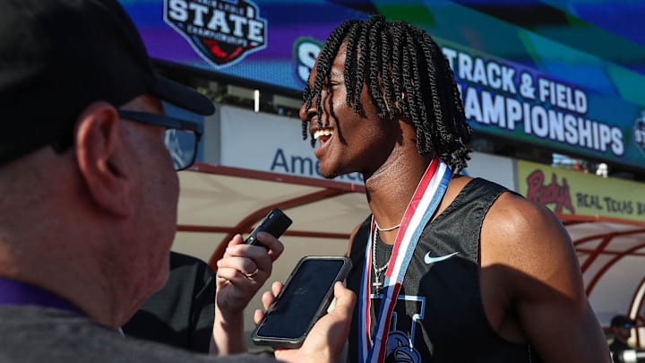Northside Harlan’s Tate Taylor is interviewed by reporters during the Class 6A UIL State track and field meet on May 3, 2025, at Mike A. Myers Stadium in Austin. This after breaking the national 100 meter record in 9.92 seconds. 