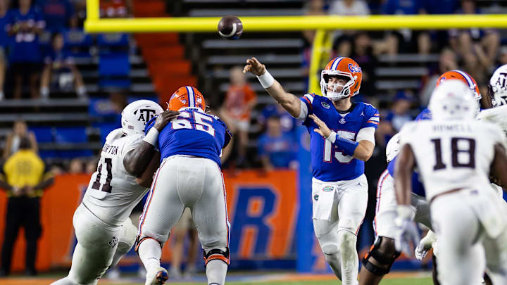 Sep 14, 2024; Gainesville, Florida, USA; Florida Gators quarterback Graham Mertz (15) throws the ball under pressure against the Texas A&M Aggies during the second half at Ben Hill Griffin Stadium. Mandatory Credit: Matt Pendleton-Imagn Images