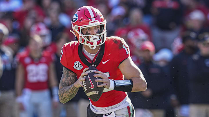 Nov 23, 2024; Athens, Georgia, USA; Georgia Bulldogs quarterback Carson Beck (15) in action against the Massachusetts Minutemen at Sanford Stadium. Mandatory Credit: Dale Zanine-Imagn Images