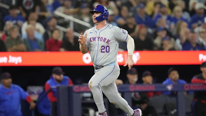 Sep 9, 2024; Toronto, Ontario, CAN; New York Mets first baseman Pete Alonso (20) scores on a single by designated hitter J.D. Martinez (not pictured) against the Toronto Blue Jays during the fourth inning at Rogers Centre. Mandatory Credit: John E. Sokolowski-Imagn Images Sep 9, 2024; Toronto, Ontario, CAN; New York Mets first baseman Pete Alonso (20) scores on a single by designated hitter J.D. Martinez (not pictured) against the Toronto Blue Jays during the fourth inning at Rogers Centre. Mandatory Credit: John E. Sokolowski-Imagn Images