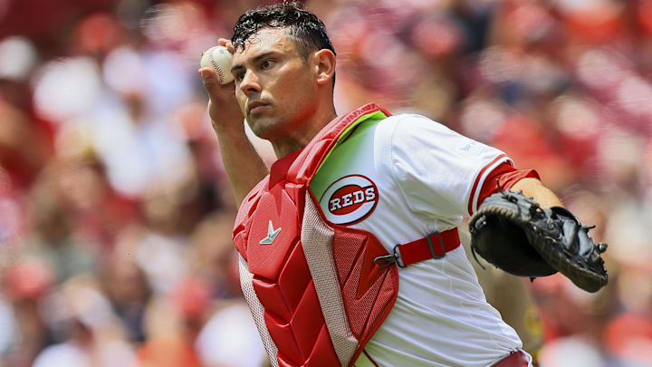 May 23, 2024; Cincinnati, Ohio, USA; Cincinnati Reds catcher Luke Maile (22) throws to third to get San Diego Padres third baseman Manny Machado (not pictured) out in the first inning at Great American Ball Park. Mandatory Credit: Katie Stratman-USA TODAY Sports