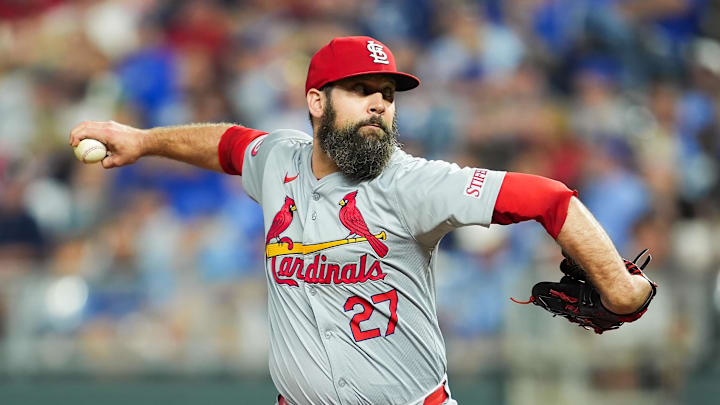 Aug 9, 2024; Kansas City, Missouri, USA; St. Louis Cardinals relief pitcher Andrew Kittredge (27) pitches during the eighth inning against the Kansas City Royals at Kauffman Stadium. Mandatory Credit: Jay Biggerstaff-Imagn Images