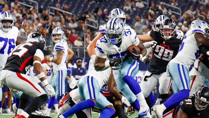 Aug 22, 2025; Arlington, Texas, USA; Dallas Cowboys running back Phil Mafah (37) breaks through the line during the fourth quarter against the Atlanta Falcons at AT&T Stadium. Mandatory Credit: Andrew Dieb-Imagn Images