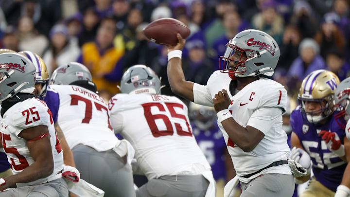 Nov 25, 2023; Seattle, Washington, USA; Washington State Cougars quarterback Cameron Ward (1) passes