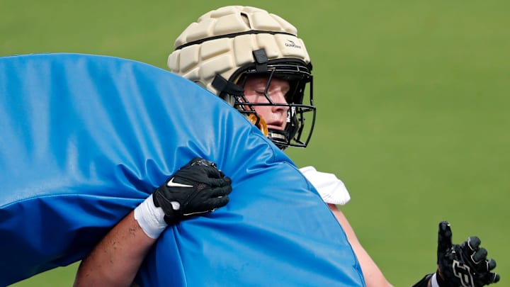 Purdue Boilermakers defensive end Logan Jellison (96) runs a drill 