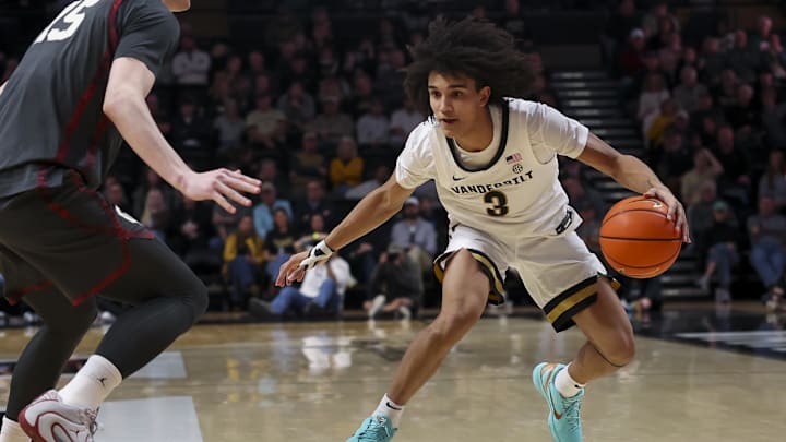 Feb 7, 2026; Nashville, Tennessee, USA;  Vanderbilt Commodores guard Tyler Tanner (3) drives to the basket against the Oklahoma Sooners during the second half at Memorial Gymnasium. Mandatory Credit: Steve Roberts-Imagn Images