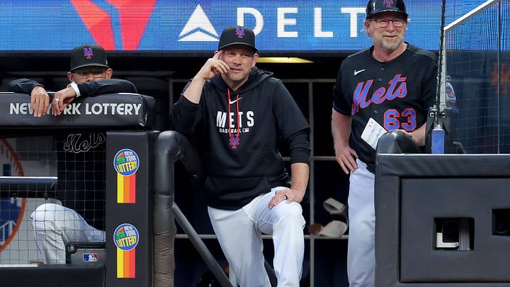 Jun 26, 2026; New York City, New York, USA; New York Mets interim manager Andy Green (center) stands in the dugout with bench coach Kai Correa (left) and third base coach Tim Leiper during the fourth inning against the Philadelphia Phillies at Citi Field. Mandatory Credit: Brad Penner-Imagn Images