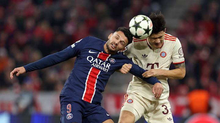 Kim Min Jae winning an aerial duel against Goncalo Ramos of PSG 