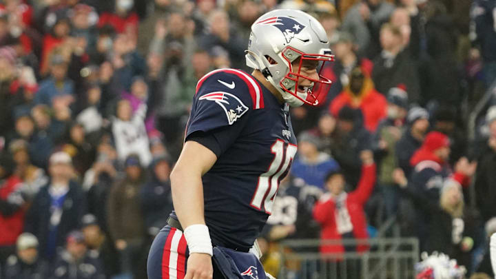 Jan 2, 2022; Foxborough, Massachusetts, USA; New England Patriots quarterback Mac Jones (10) reacts after a touchdown against the Jacksonville Jaguars in the second half at Gillette Stadium. Mandatory Credit: David Butler II-Imagn Images