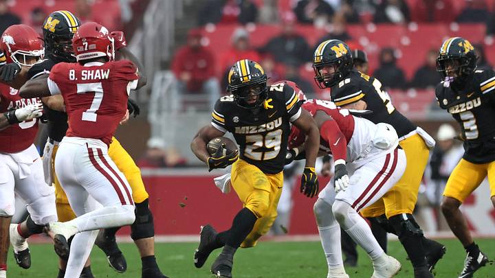 Nov 29, 2025; Fayetteville, Arkansas, USA; Missouri Tigers running back Ahmad Hardy (29) rushes during the second quarter against the Arkansas Razorbacks at Donald W. Reynolds Razorback Stadium. Mandatory Credit: Nelson Chenault-Imagn Images Nov 29, 2025; Fayetteville, Arkansas, USA; Missouri Tigers running back Ahmad Hardy (29) rushes during the second quarter against the Arkansas Razorbacks at Donald W. Reynolds Razorback Stadium. Mandatory Credit: Nelson Chenault-Imagn Images