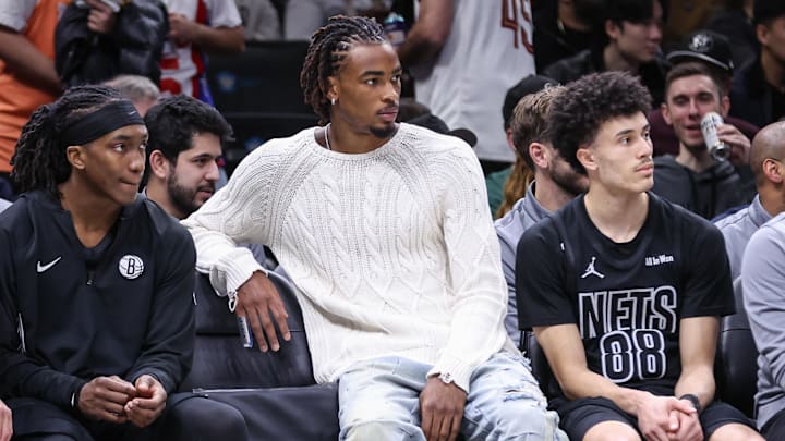 Mar 1, 2026; Brooklyn, New York, USA; Brooklyn Nets center Nic Claxton (not in uniform) watches from the bench in the second quarter against the Cleveland Cavaliers at Barclays Center. Mandatory Credit: Wendell Cruz-Imagn Images