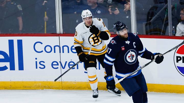 Oct 2, 2026; Winnipeg, Manitoba, CAN;  Boston Bruins forward J.J. Peterka (10) celebrates his goal against the Winnipeg Jets during the overtime period at Canada Life Centre.  Mandatory Credit: Terrence Lee-Imagn Images