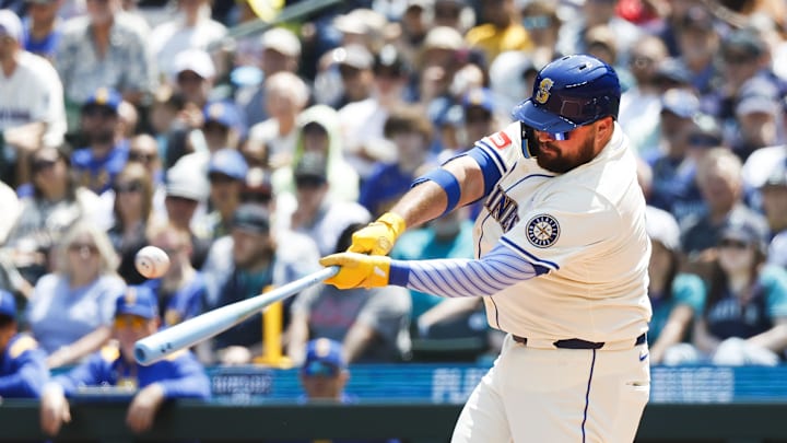 Seattle Mariners first baseman Rowdy Tellez (23) hits a double against the Cleveland Guardians during the second inning at T-Mobile Park on June 15.