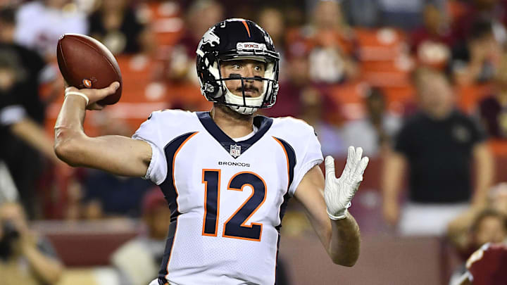 Aug 24, 2018; Landover, MD, USA; Denver Broncos quarterback Paxton Lynch (12) attempts a pass in a preseason game.