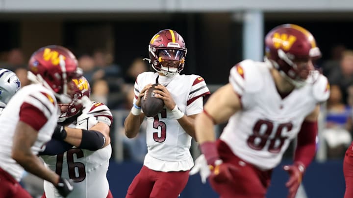 Jan 5, 2025; Arlington, Texas, USA; Washington Commanders quarterback Jayden Daniels (5) throws a pass against the Dallas Cowboys during the second quarter at AT&T Stadium. Mandatory Credit: Tim Heitman-Imagn Images Jan 5, 2025; Arlington, Texas, USA; Washington Commanders quarterback Jayden Daniels (5) throws a pass against the Dallas Cowboys during the second quarter at AT&T Stadium. Mandatory Credit: Tim Heitman-Imagn Images