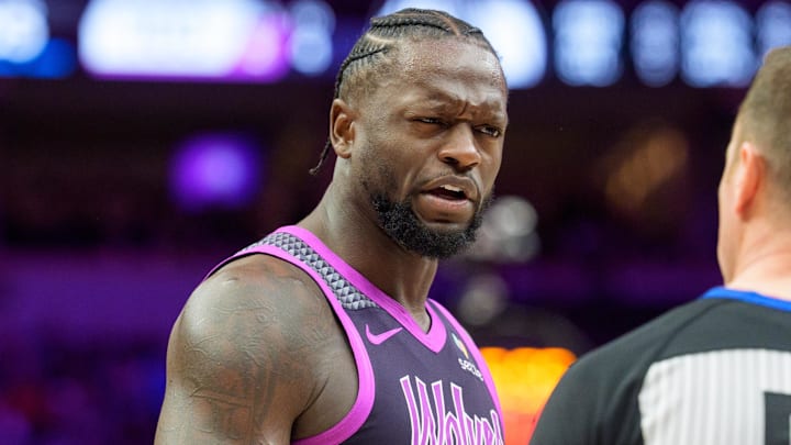 Feb 20, 2026; Minneapolis, Minnesota, USA; Minnesota Timberwolves forward Julius Randle (30) talks with referee Josh Tiven (58) in the fourth quarter against the Dallas Mavericks at Target Center. Mandatory Credit: Matt Blewett-Imagn Images