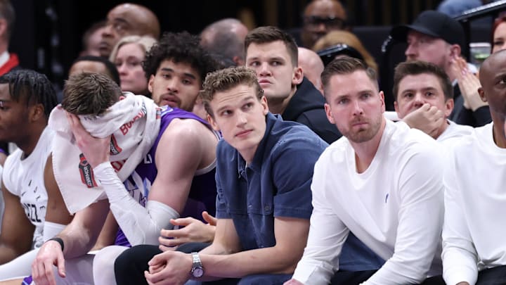 Mar 2, 2025; Salt Lake City, Utah, USA; Utah Jazz forward Lauri Markkanen (center) looks on from the bench during the second half of the game against the New Orleans Pelicans at Delta Center. Mandatory Credit: Rob Gray-Imagn Images