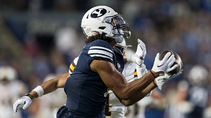 Keanu Hill hauls in a long bomb against Wyoming.