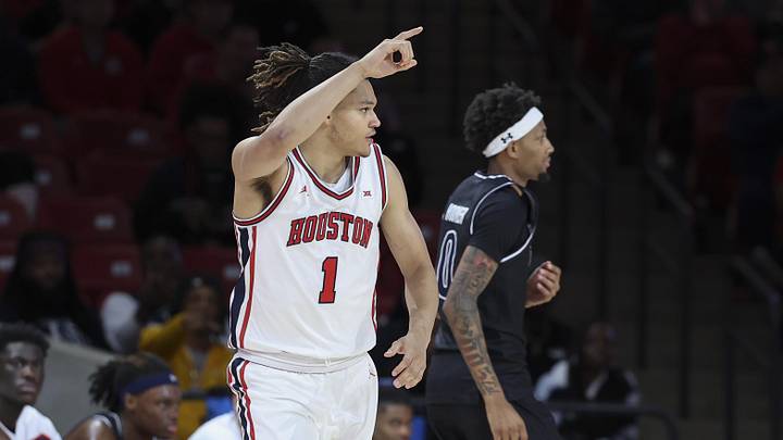 Dec 10, 2025; Houston, Texas, USA; Houston Cougars guard Isiah Harwell (1) reacts after scoring a basket during the first half against the Jackson State Tigers at Fertitta Center.