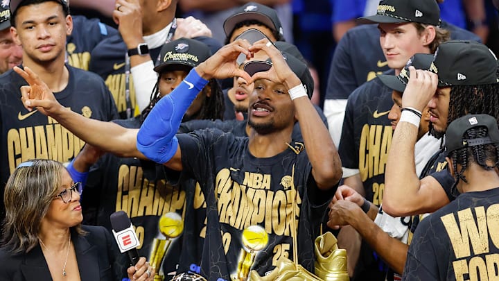 Jun 22, 2025; Oklahoma City, Oklahoma, USA; Oklahoma City Thunder guard Shai Gilgeous-Alexander (2) holds up a heart for fans at the end of game seven of the 2025 NBA Finals after defeating the Indiana Pacers at Paycom Center. Mandatory Credit: Alonzo Adams-Imagn Images