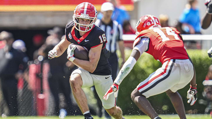 Apr 12, 2025; Athens, GA, USA; Georgia Bulldogs wide receiver London Humphreys (16) runs against defensive back Adrian Maddox (14) during the Georgia Spring game at Sanford Stadium. Mandatory Credit: Dale Zanine-Imagn Images Apr 12, 2025; Athens, GA, USA; Georgia Bulldogs wide receiver London Humphreys (16) runs against defensive back Adrian Maddox (14) during the Georgia Spring game at Sanford Stadium. Mandatory Credit: Dale Zanine-Imagn Images