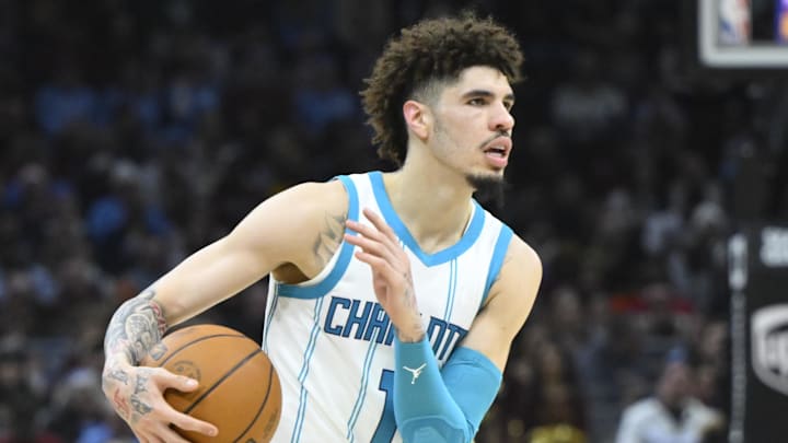 Jan 5, 2025; Cleveland, Ohio, USA; Charlotte Hornets guard LaMelo Ball (1) brings the ball up court in the second quarter against the Cleveland Cavaliers at Rocket Mortgage FieldHouse. Mandatory Credit: David Richard-Imagn Images