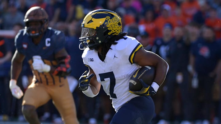 Michigan's Donovan Edwards runs the ball against Illinois.
