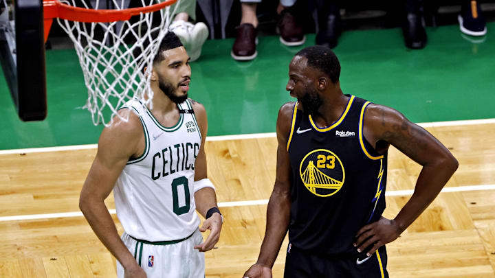 Boston Celtics forward Jayson Tatum (0) and Golden State Warriors forward Draymond Green (23) during the 2022 NBA Finals at TD Garden. 
