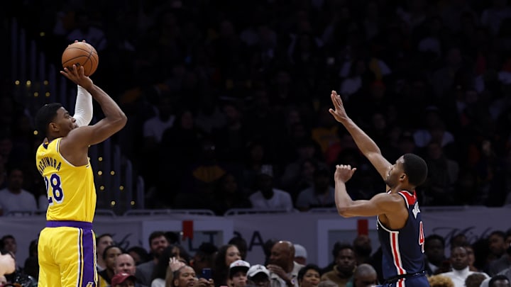 Apr 3, 2024; Washington, District of Columbia, USA; Los Angeles Lakers forward Rui Hachimura (28) shoots the ball over Washington Wizards guard Jared Butler (4) at Capital One Arena. Mandatory Credit: Geoff Burke-Imagn Images