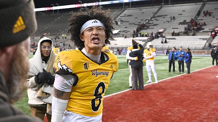 Nov 30, 2024; Pullman, Washington, USA; Wyoming Cowboys cornerback Tyrese Boss (8) celebrates after a game against the Washington State Cougars at Gesa Field at Martin Stadium. Mandatory Credit: James Snook-Imagn Images Nov 30, 2024; Pullman, Washington, USA; Wyoming Cowboys cornerback Tyrese Boss (8) celebrates after a game against the Washington State Cougars at Gesa Field at Martin Stadium. Mandatory Credit: James Snook-Imagn Images