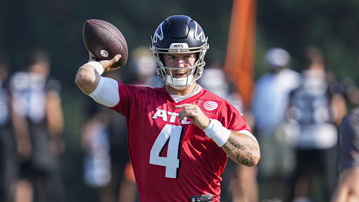 Jul 27, 2023; Flowery Branch, GA, USA; Atlanta Falcons quarterback Taylor Heinicke (4) passes the