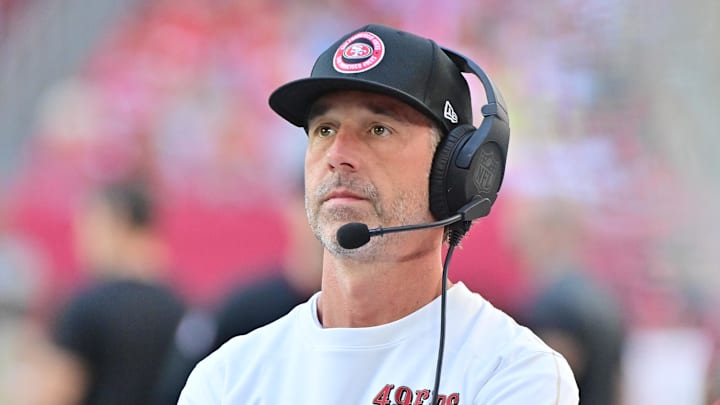Jan 5, 2025; Glendale, Arizona, USA; San Francisco 49ers head coach Kyle Shanahan looks on in the first half against the Arizona Cardinals at State Farm Stadium. Mandatory Credit: Matt Kartozian-Imagn Images