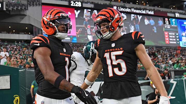 Aug 7, 2025; Philadelphia, Pennsylvania, USA; Cincinnati Bengals wide receiver Ja'Marr Chase (1) celebrates his touchdown with wide receiver Charlie Jones (15) during the first quarter against the Philadelphia Eagles at Lincoln Financial Field. Mandatory Credit: Eric Hartline-Imagn Images