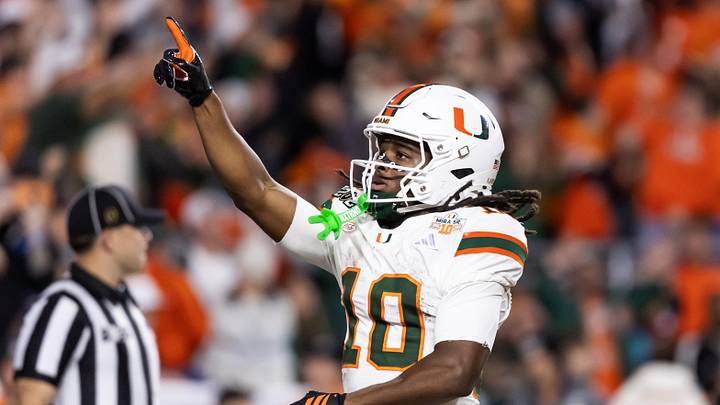 Jan 19, 2026; Miami Gardens, FL, USA; Miami Hurricanes wide receiver Malachi Toney (10) celebrates after scoring a touchdown against the Indiana Hoosiers during the College Football Playoff National Championship game at Hard Rock Stadium. Mandatory Credit: Mark J. Rebilas-Imagn Images
