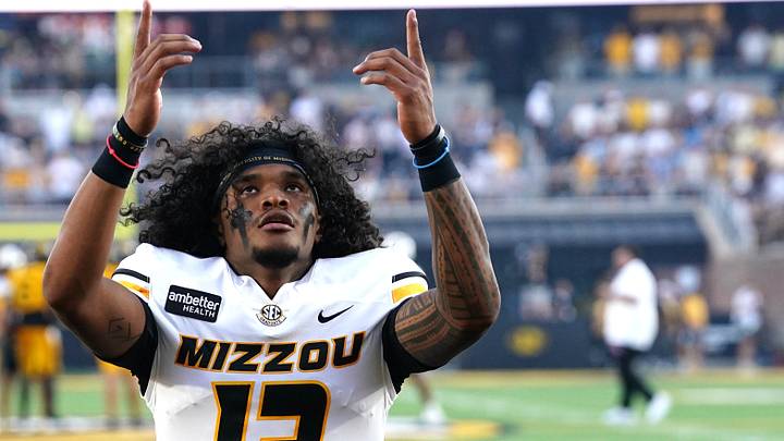 Sep 3, 2026; Columbia, Missouri, USA; Missouri Tigers quarterback Austin Simmons (13) is seen prior to the game against the Arkansas-Pine Bluff Golden Lions at Faurot Field at Memorial Stadium. Mandatory Credit: Denny Medley-Imagn Images Sep 3, 2026; Columbia, Missouri, USA; Missouri Tigers quarterback Austin Simmons (13) is seen prior to the game against the Arkansas-Pine Bluff Golden Lions at Faurot Field at Memorial Stadium. Mandatory Credit: Denny Medley-Imagn Images
