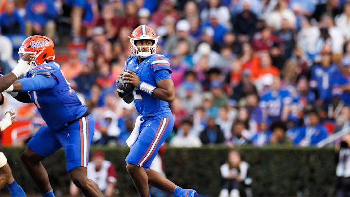 Nov 29, 2025; Gainesville, Florida, USA; Florida Gators quarterback DJ Lagway (2) looks to throw against the Florida State Seminoles during the first half at Ben Hill Griffin Stadium. Mandatory Credit: Matt Pendleton-Imagn Images