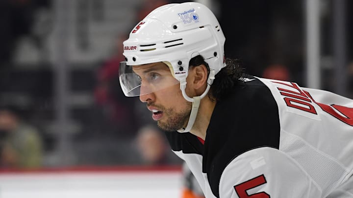 Jan 27, 2025; Philadelphia, Pennsylvania, USA; New Jersey Devils defenseman Brenden Dillon (5) against the Philadelphia Flyers at Wells Fargo Center. Mandatory Credit: Eric Hartline-Imagn Images