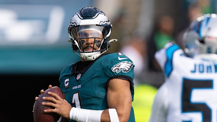 Dec 8, 2024; Philadelphia, Pennsylvania, USA; Philadelphia Eagles quarterback Jalen Hurts (1) in action against the Carolina Panthers during the first quarter at Lincoln Financial Field. Mandatory Credit: Bill Streicher-Imagn Images Dec 8, 2024; Philadelphia, Pennsylvania, USA; Philadelphia Eagles quarterback Jalen Hurts (1) in action against the Carolina Panthers during the first quarter at Lincoln Financial Field. Mandatory Credit: Bill Streicher-Imagn Images