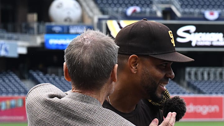 Mar 30, 2023; San Diego, California, USA; San Diego Padres shortstop Xander Bogaerts (2) embraces chairman Peter Seidler during batting practice before the game against the Colorado Rockies at Petco Park. Mandatory Credit: Orlando Ramirez-Imagn Images Mar 30, 2023; San Diego, California, USA; San Diego Padres shortstop Xander Bogaerts (2) embraces chairman Peter Seidler during batting practice before the game against the Colorado Rockies at Petco Park. Mandatory Credit: Orlando Ramirez-Imagn Images