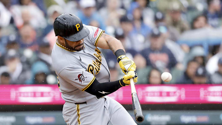 Jun 19, 2025; Detroit, Michigan, USA;  Pittsburgh Pirates outfielder Tommy Pham (28) hits a sacrifice fly to score a run in the sixth inning against the Detroit Tigers at Comerica Park. Mandatory Credit: Rick Osentoski-Imagn Images
