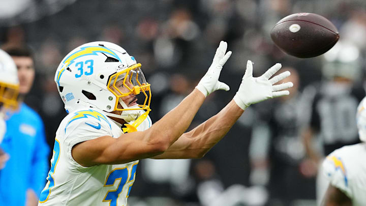 Jan 5, 2025; Paradise, Nevada, USA; Los Angeles Chargers cornerback Deane Leonard (33) warms up before a game against the Las Vegas Raiders at Allegiant Stadium. Mandatory Credit: Stephen R. Sylvanie-Imagn Images