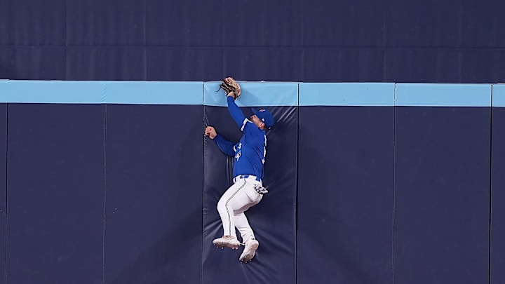 Aug 27, 2025; Toronto, Ontario, CAN; Toronto Blue Jays centre fielder Daulton Varsho (5) catches a fly ball for the third out against the Minnesota Twins during the third inning at Rogers Centre. Mandatory Credit: Nick Turchiaro-Imagn Images