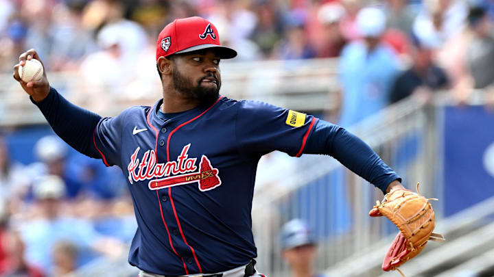 Atlanta Braves pitcher Reynaldo Lopez (40) throws a pitch in Grapefruit League action