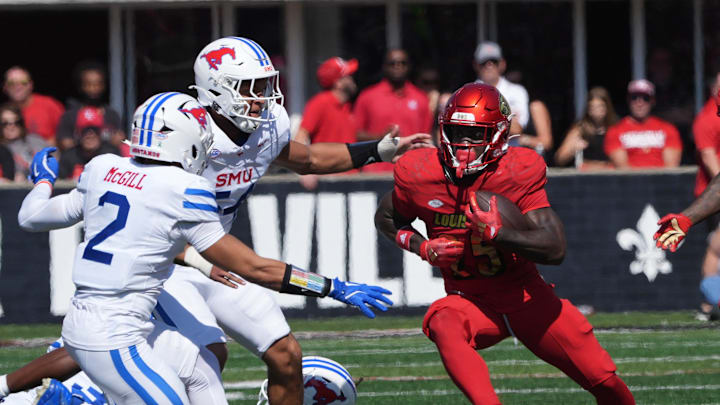 Louisville’s Issac Brown gets a first down against SMU this Saturday.
Oct. 5, 2024 Louisville’s Issac Brown gets a first down against SMU this Saturday.
Oct. 5, 2024