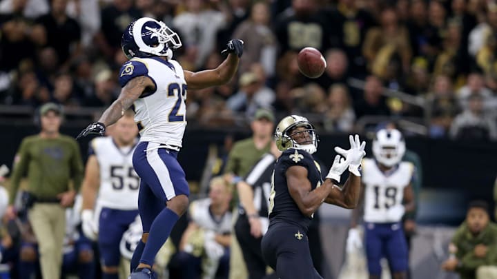 Nov 4, 2018; New Orleans, LA, USA; New Orleans Saints wide receiver Michael Thomas (13) hauls in a touchdown catch that went over the head of Los Angeles Rams cornerback Marcus Peters (22) in the fourth quarter at the Mercedes-Benz Superdome. Saints won, 45-35. Mandatory Credit: Chuck Cook-Imagn Images
