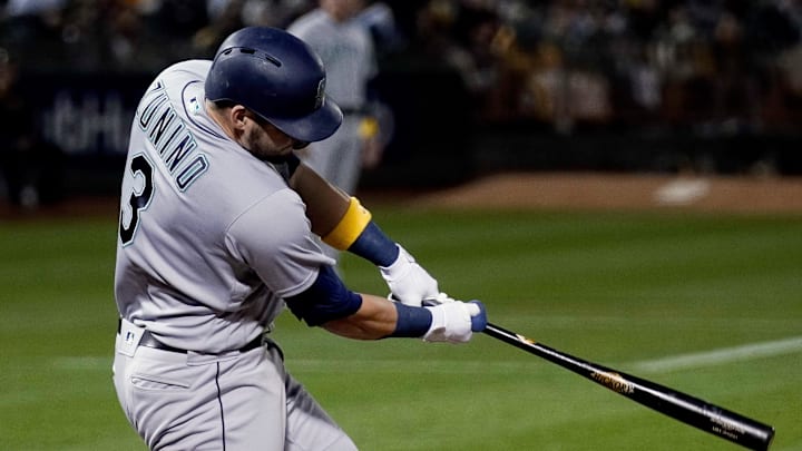 Seattle Mariners catcher Mike Zunino (3) hits a double against the Oakland Athletics during the fifth inning at the Oakland Coliseum in 2018.